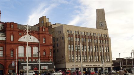 TC CAMP Former Woolworth’s building with clock tower
