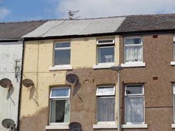 Image of proliferation of satellite dishes and general disrepair on Shannon Street