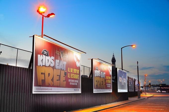 Large advertising billboards in car park