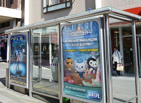 Advertising posters in a bus shelter