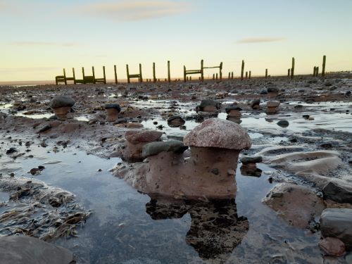 Image portraying beach lowering at Anchorsholme with clay underneath visible.