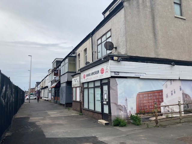 Row of dilapidated shops