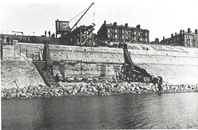 Historical image of repair work being carried out on sea defences in Blackpool