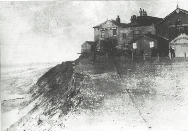 Historical image of Uncle Tom's Cabin in Blackpool sat on sandy cliffs