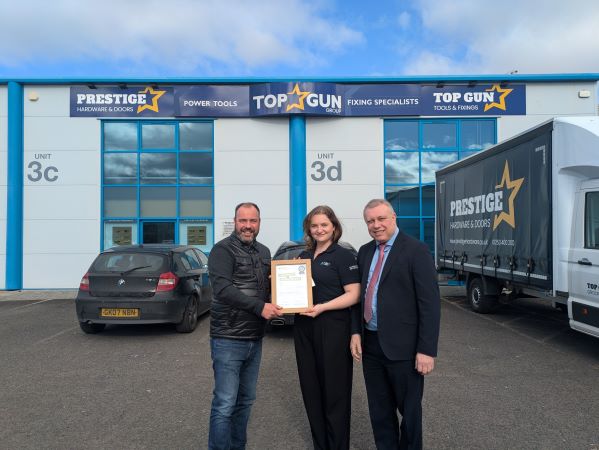  Cllr Mark Smith with Top Gun Tools & Fixings team presenting Blackpool Net Zero Academy certificate