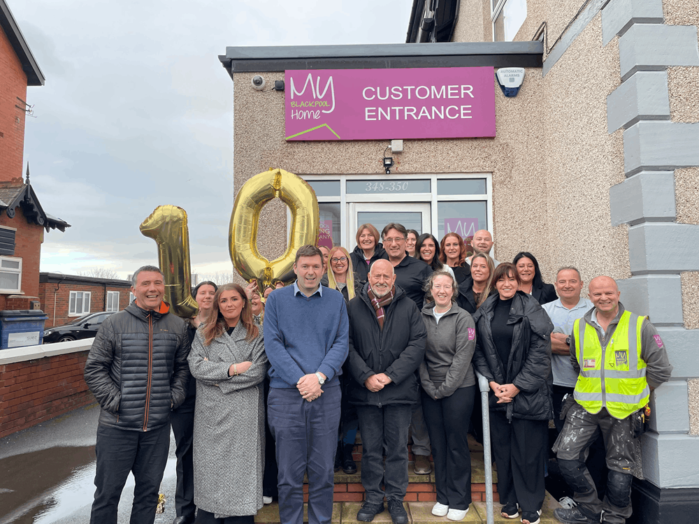A group of people smiling for a photo 
