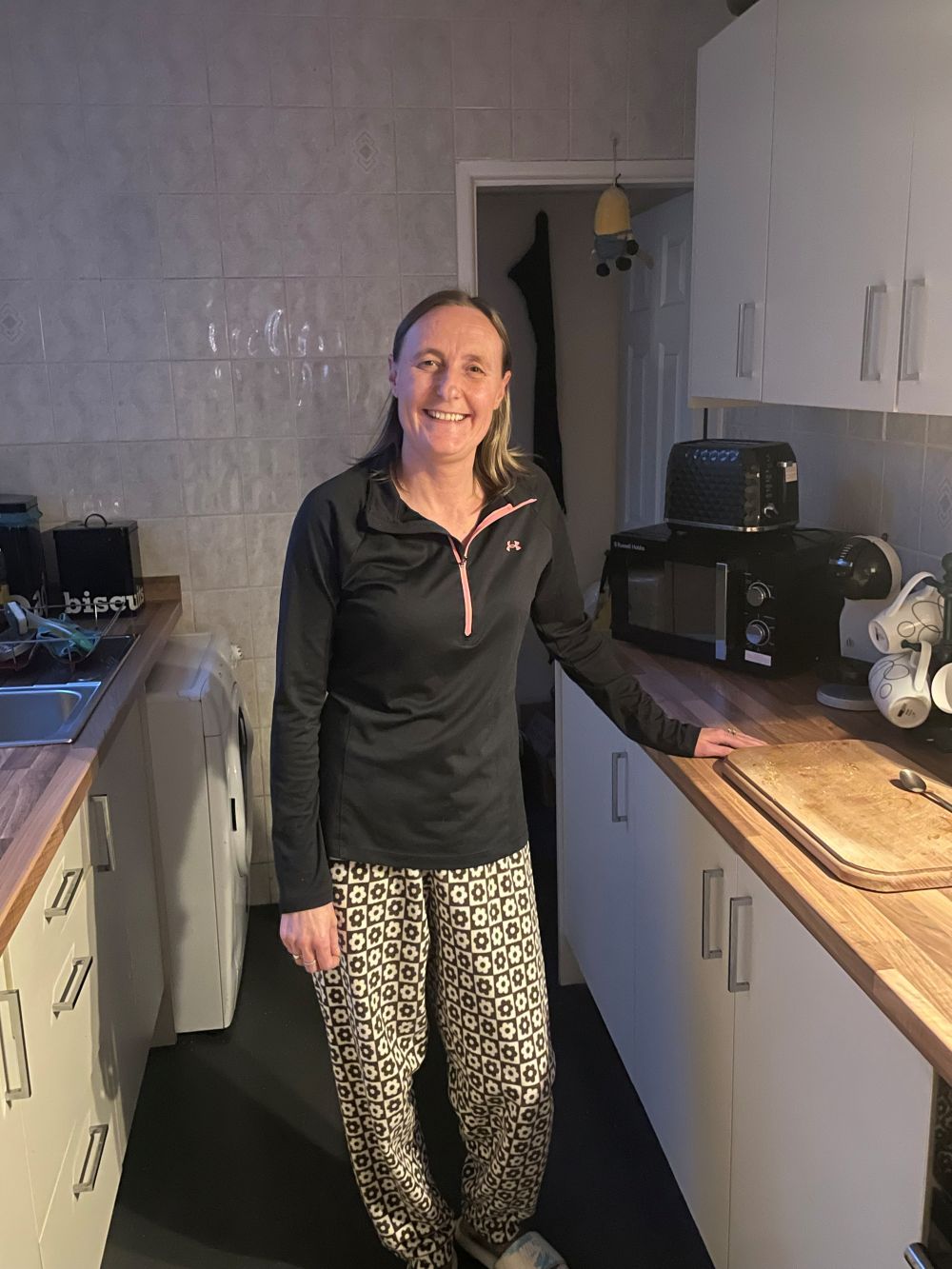 Image shows Katie - a tenant with Blackpool Housing Company's lettings side, My Blackpool Home - in her kitchen