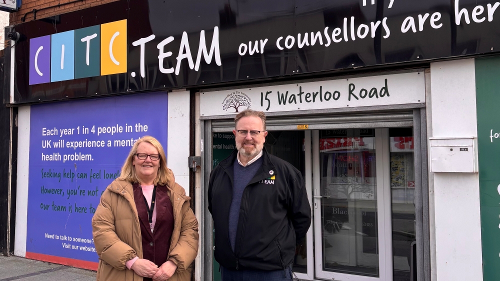 Cllr Lynn Williams with Stuart Hutton-Brown outside Counselling In The Community charity