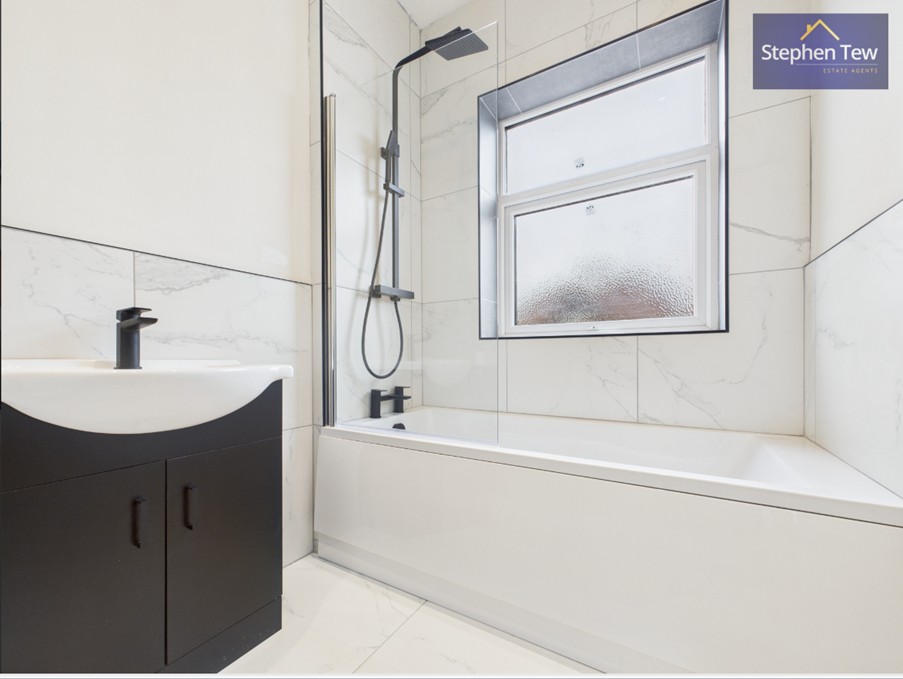 Image shows a newly renovated, modern bathroom