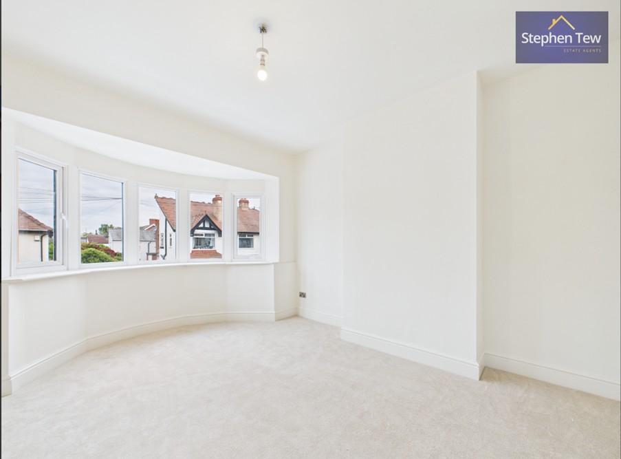 Image shows a newly renovated, bright and spacious bedroom