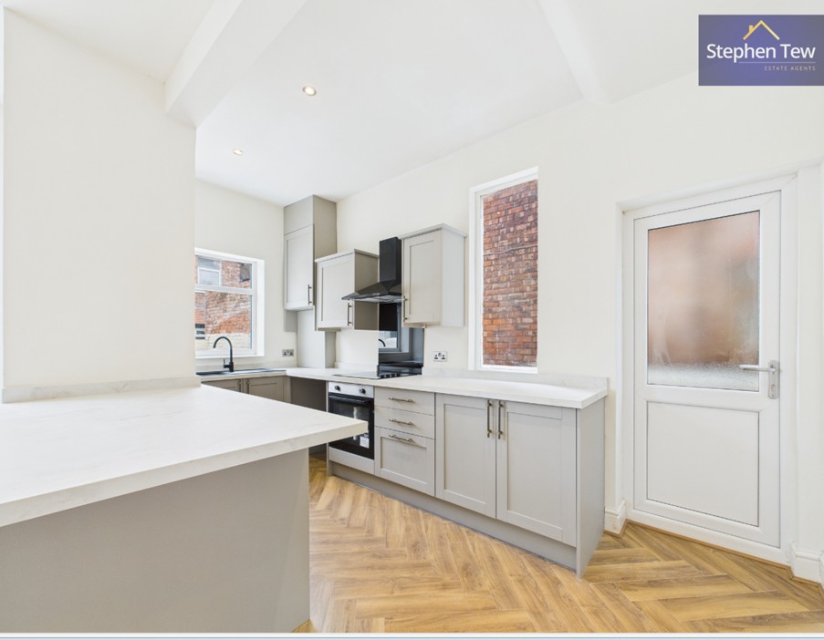 Image shows a newly renovated, modern kitchen