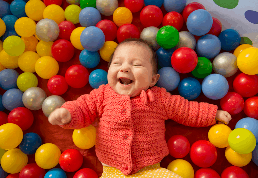 Baby in a ball pit 