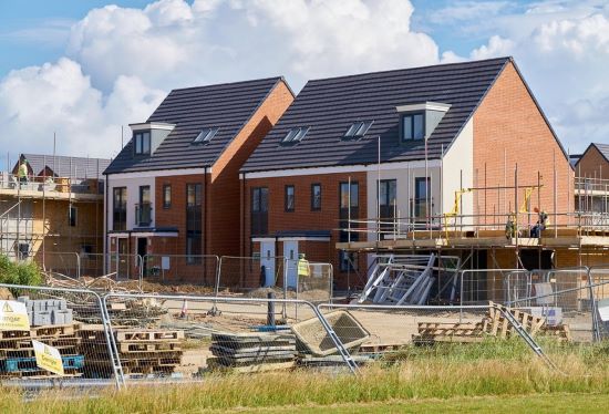  A group of houses under construction, symbolizing Blackpool's significant housing regeneration project for community improvement.