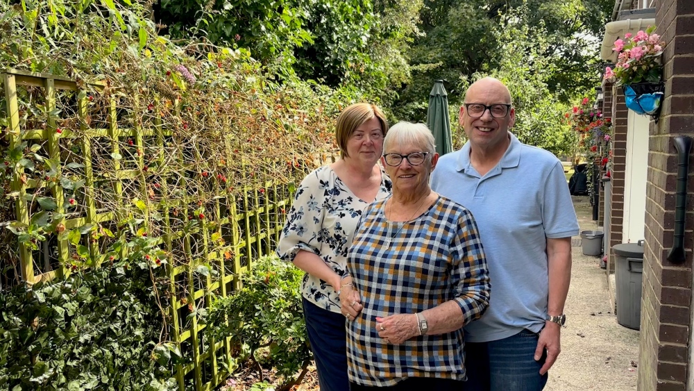 Josie Webster (front) with her niece and nephew, Sue and Chris Dawes, outside her new home at Cherry Tree Gardens