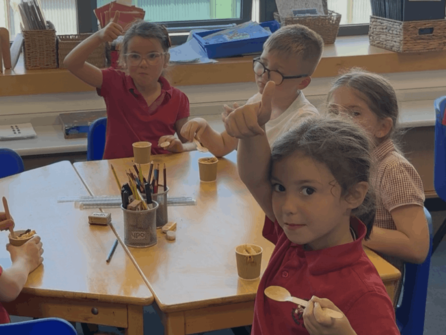 A group of children eating food 