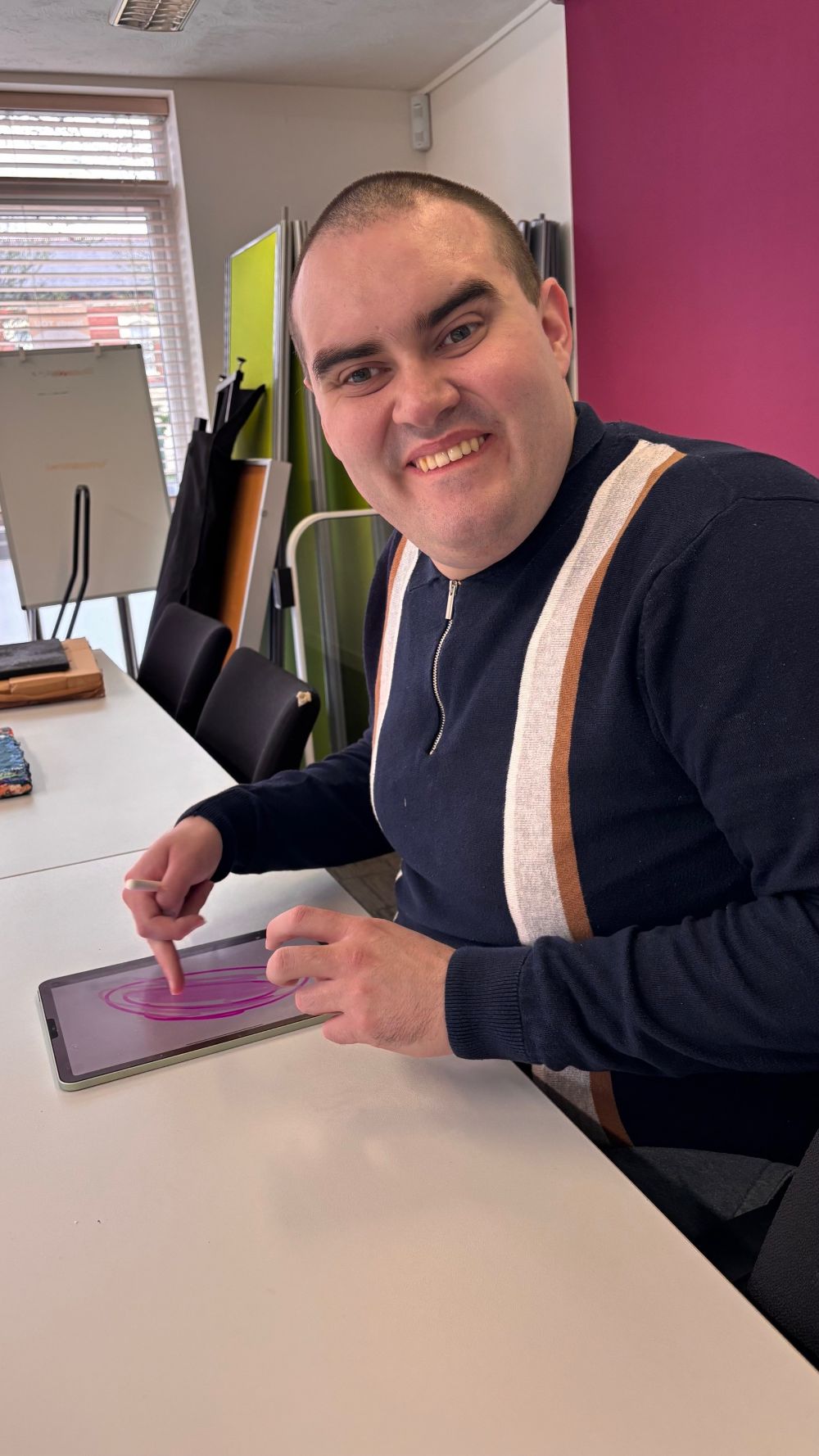 Artist Conor creating one of his digital pieces