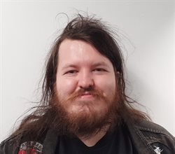 Headshot of Matthew.