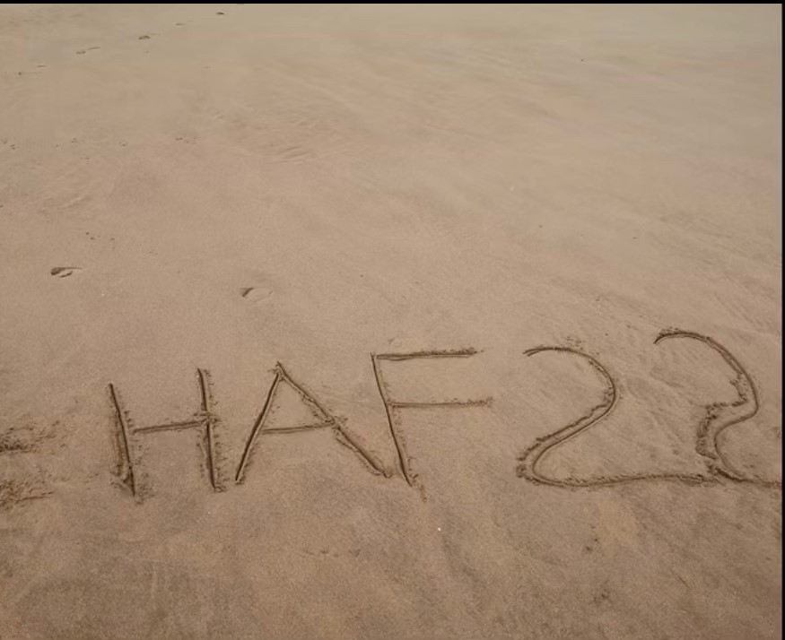 HAF22 written in sand