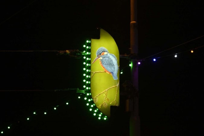 Illuminated feature of roadside.