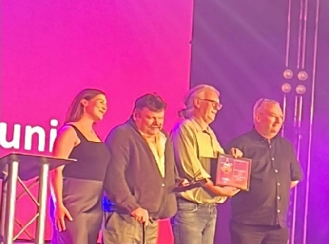 Volunteers - Volunteers collect their award for supporting water butt installations