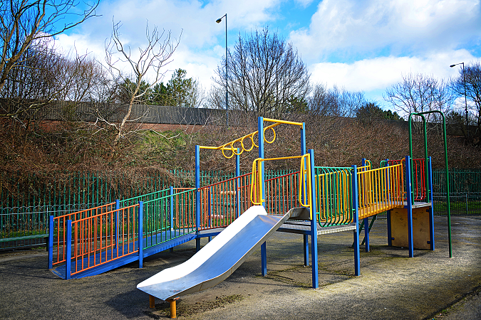 Children's climbing frame and slide.