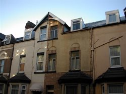 Properties with Roof dormers, different window treatments and cladding on Yorkshire Street