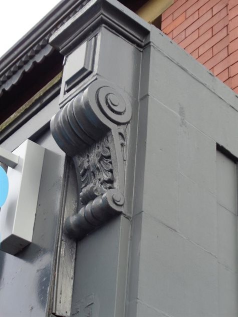 Example of a Console bracket on Co-op frontage