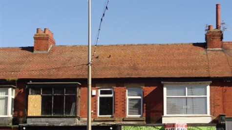 Decorative red clay tile roof covering to houses at 1 – 21 Layton Road
