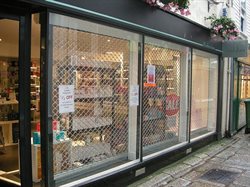 High vision internal shutters on a shopfront