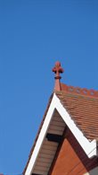 Terracotta finial and ridge cresting on roof