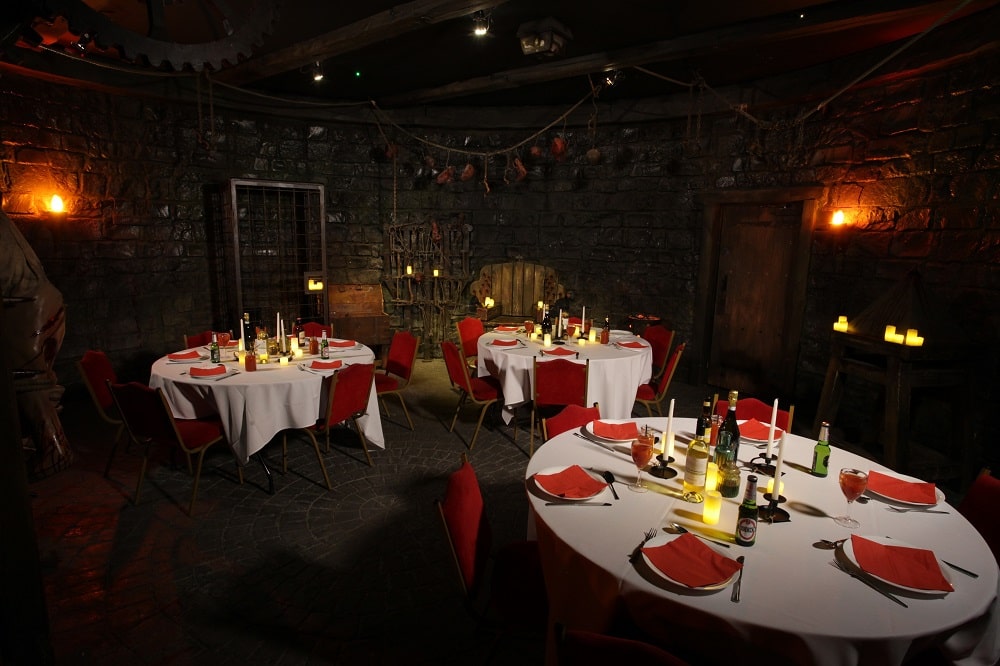 Decorated tables in a dark room